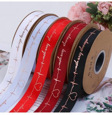 China New Heart Gold Printing Florist Supplies Grosgrain Floral Double Sided Colorful Stain Ribbon For Valentine's Day for sale