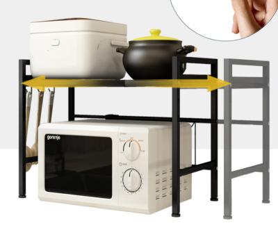 China Viable Retractable Adjustable Oven Rack Microwave Oven Rack Electric Kitchen Rice Cooker Storage Rack for sale