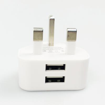 China Mobile Phone Factory Outlet Dual USB Wall Charger UK Plug 5V 2.1A 3 Pin Phone Charger for sale