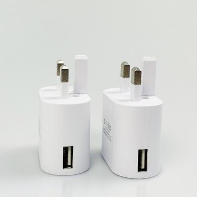 China Wholesale portable tether 5v 2a one port 3 pin mobile phone shrinkable UK plug wall charger for mobile phone for sale