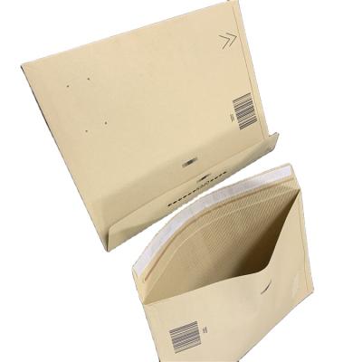 China Strong Adhesive Glue 100% Self Adhesive Recyclable Seal Recycled Kraft Paper Cover Mailer Bag Cushion Kraft Paper Corrugated Padded Wrap Te koop