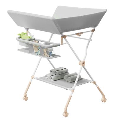 China Baby Bath Changing Table Nursing Station Foldable/Breathable/Washable Universal Standing Diaper Organizer Folding Portable Baby Changing Table for sale