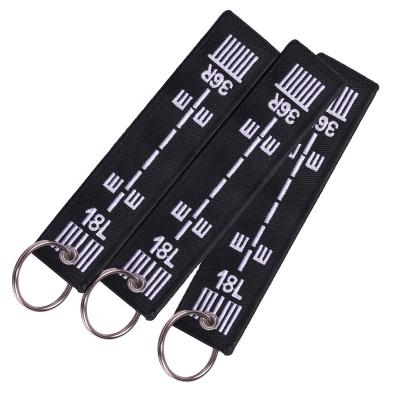 China Embroidery Key Chains Remove Before Flight Chain 18L36R Keychains Promotional Gift for sale