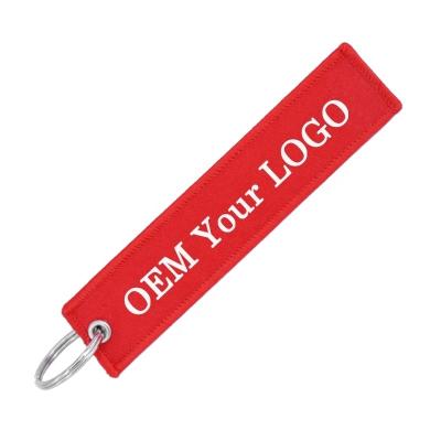 China Polyester Twill Sample Cost For Custom Embroidery Key Chain REMOVE BEFORE FLIGHT Custom Key Flag for sale