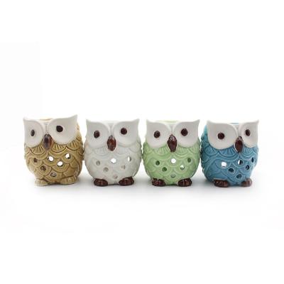 China Decoration factory direct sale cheap ceramic owl aroma oil burner for home decoration for sale