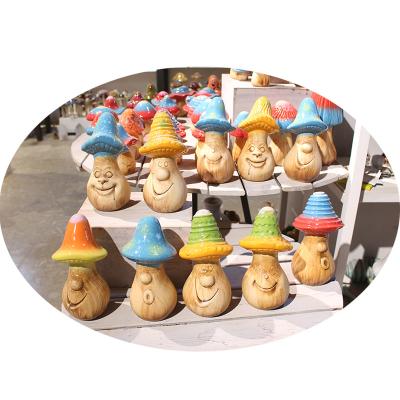 China Art Custom Large Face Expression Garden Porcelain Folk Smile Ornament For Ceramic Mushroom Spring Decoration for sale