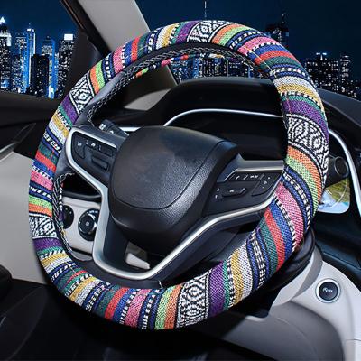 China beach & Holiday Canvas Universal Elastic Car Wheel Cover Ethnic Styling Car Steering Accessories for sale