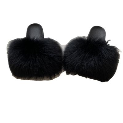 China 2021 Fashion Trend Raccoon Fox Fur Slippers XL Warm Full Fur Slides For Women for sale