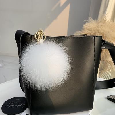 China Fashionable Fur Ball Key Bag Car Bag Wallet Accessories Purse Key Chain Decoration With Real Fox Fur Pom Pom Plush Key Chain for sale