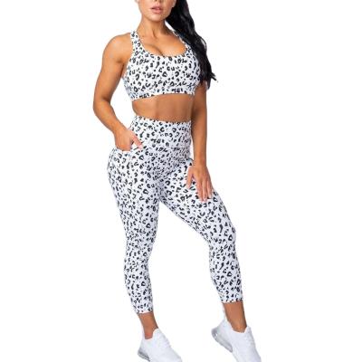 China Breathable Custom Polyester And Spandex Sublimated Capri Activewear Leopard Print Yoga Leggings For Women for sale