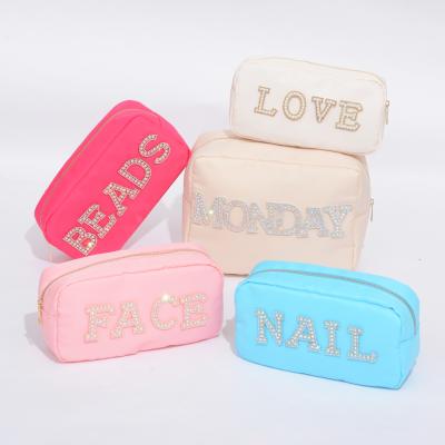 China Wholesale Waterproof Nylon Pouch Embroidery Bag Makeup Towel Fashion Promotion Travel Cosmetic Bag for sale