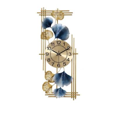 China Creative high-grade antique luxury simple art household living room wall clock leaf Ginkgo metal style clock for sale