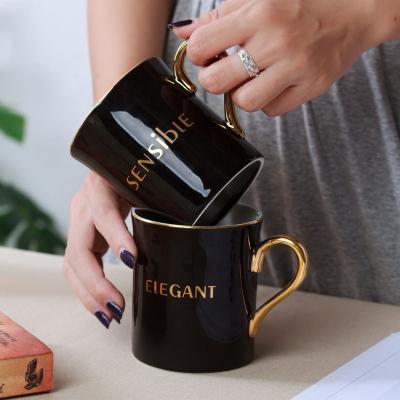 China China Luxury Shiny Gloss Stocked Items Logo Coffee Ceramic Porcelain Mug Custom Made With Gold Handle for sale