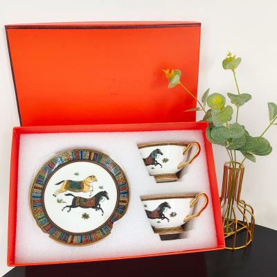 China Restaurant Gold Stocked Ceramic Teacup Sets Luxury Bone China Coffee Cup With Saucer for sale