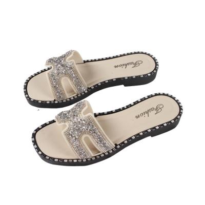 China New Style Baiyi Fashion Trend Rhinestone Sandals Ladies G Flat Casual Slippers Ladies Designer Casual Slippers for sale