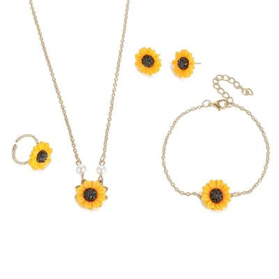 China Wholesale Lovely Lovely Girls Use Cross Chain Finger Pendant Ring Hand Chain Jewelry Sun Flower Necklace Earring Set for sale