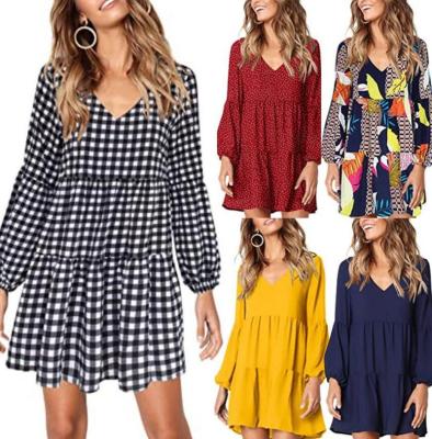 China Anti-Wrinkle Women Summer Tunic Casual Loose V-Neck Overflowing Relief Team Dresses for sale