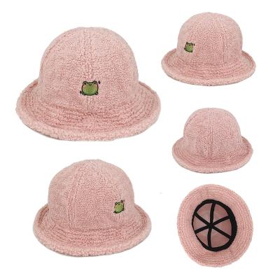 China Custom Embroidery Logo Furry Winter Bucket Hat Custom Made Fuzzy Faux Fur Bucket Hats Character Character for sale