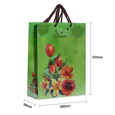 China Custom High Quality Recycled Materials Gift Paper Bag With Handles Luxury Green Flower Tote Bag For Sale for sale