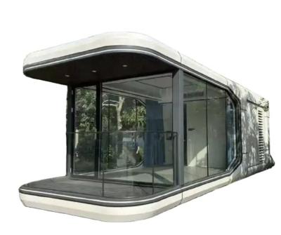 China Modern prefabricated outdoor villa mobile modular capsule house commercial space airship pod with kitchen and door lock for sale