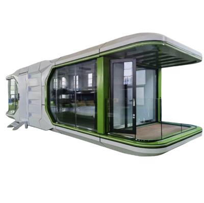 China Modern prefabricated commercial airship pod mobile home/hotel/office space capsule house with kitchen and door lock e7 for sale