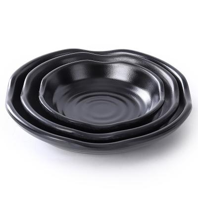 China Sustainable Reusable, safe, and environmentally friendly black irregular melanine dinner ware appetizer plates dessert plate for sale