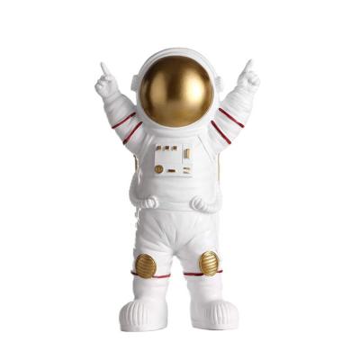 China New Europe Design Modern Creative Indoor Home Decorative Golden Astronaut Sculpture for sale