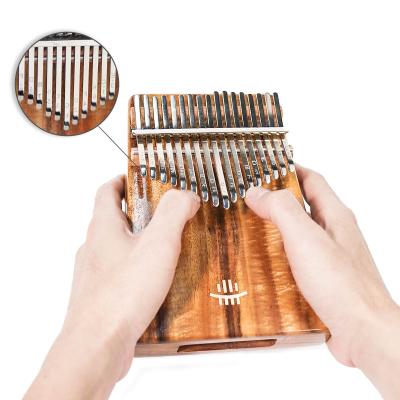 China GIF Pendant Kalimba 17 Main Kalimba (Acacia Mangium) Marimba Piano Thumb Finger Accessory Mechanical Exquisite Good Musical Instrument for sale