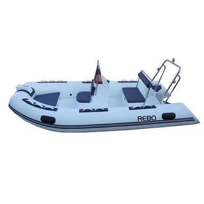 China RIB390 13ft Hypalon/PVC Fiberglass Hull Luxury Rigid Rowing Inflatable Boat For Family Fishing for sale