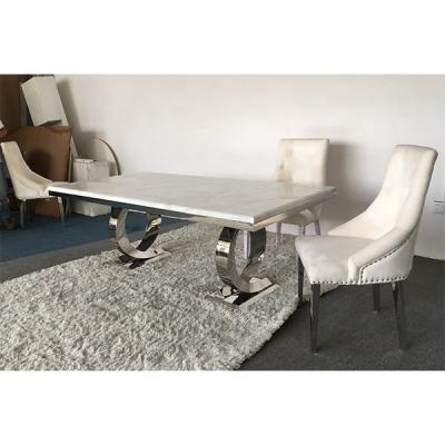 China Luxury Scandinavian marble dining table and comfort table chair combination for sale