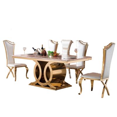 China Hot Selling Comfort Table A9004 Rose Gold Marble Dining Table Design Table Set for sale