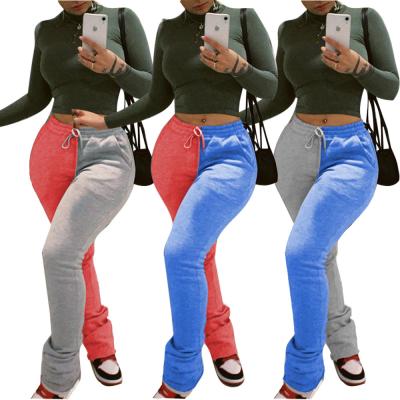 China Anti-wrinkle solid color stitching leisure sports thick drawstring women's stacked women's sports tracksuit pants for sale