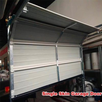 China Automatic Single Sectional Garage Door 40mm Skin Grain Emossed Pattern Panel Residentinal Wooden Garage Door for sale