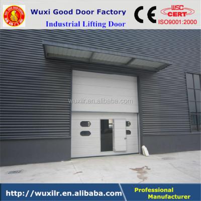 China Large Overhead High Lifting High Performance Rolling Industrial Door With Perspective Windows for sale