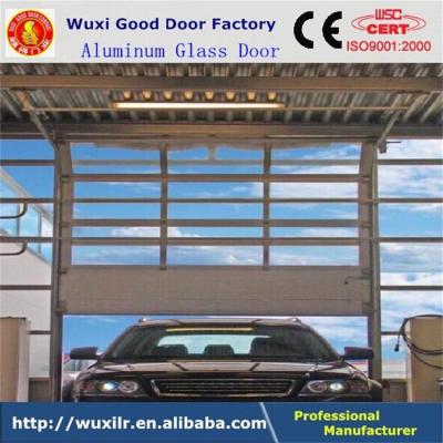 China Car 4s garage auto luxury aluminum frame polycarbonate transparent glass sectional door with pedestrian door for sale