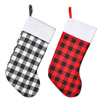 China Chimeras Holiday Decorate Classic Red And Black Check Christmas Decoration Stockings With Christmas Tree for sale