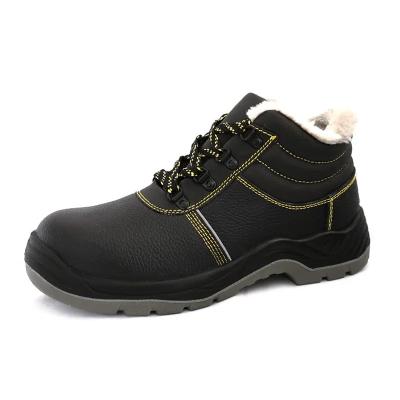 China Zapatos de seguridad de invierno de cuero genuino impermeables calurosas botas de trabajo hombres en venta