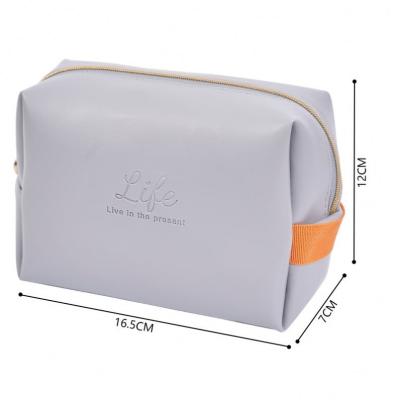 China Large Capacity Promotional Women Travel Gift Storage Customize Fake Makeup Recycled PU Leather Cosmetic Bag for sale