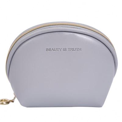 China Portable Travel Mini Make Up Bag Unicorn Quilted Stylish Logo Small Lip Makeup Travel Cosmetic Case Portable White for sale