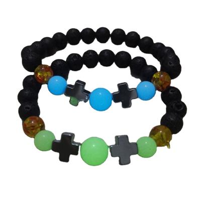 China Glowing Cross Bracelets from Hongyu Jane Eyre Wholesale New Yellow Amber Bead Hematite Bracelet Black Lava Volcanic Beaded Luminous Two for sale