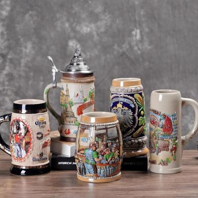 China Sustainable Quality German Oktoberfest 3D Relief Embossed Ceramic Beer Mug With Metal Lid for sale