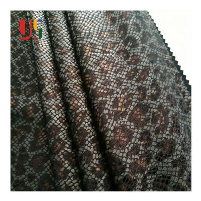 China Waterproof Snakeskin Plain Dyed Knitted Tank Top Foil Weft Multicolor Hot Stamping Metallic Fabric For Women Dress Dress for sale