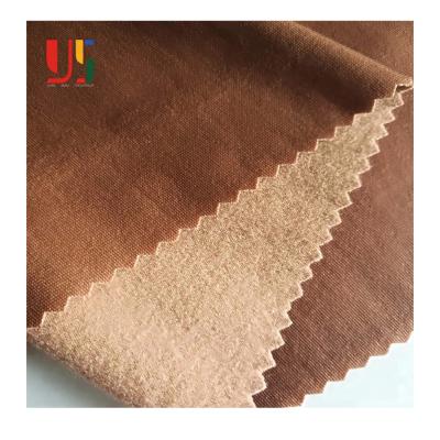 China 100D DTY waterproof khaki plain dyed spandex weft polyester tank top foil hot stamping knitted fabric for women coat for sale