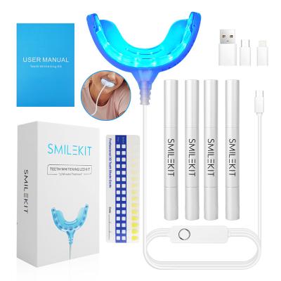 China Convenient Tooth Whitener Professional LED Light Teeth Whitening Kit with 4 Pen Bleaching Gel for sale