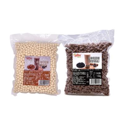 China Bubble Tea Brown Tapioca Golden Pearl For Bubble Tea Design Pearl Milk Tea Supplementing 1kg Vacuum Bag Ball Milk Tea Wholesale for sale