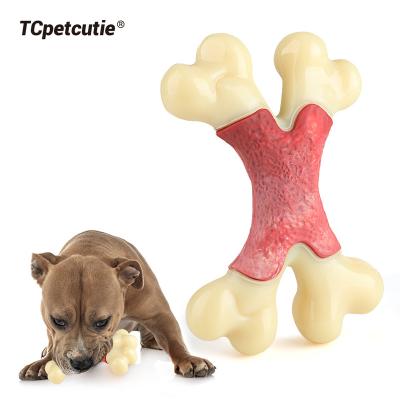 China New Design Indestructible Bone Stocked Train Non-Toxic Nylon Dog Toy Tough Dog Chew Toys for sale