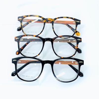 China Wooden Fashionable Classic Round Decorative Neutral Eyeglasses Acetate Nail Rice Optical Eye Frame for sale