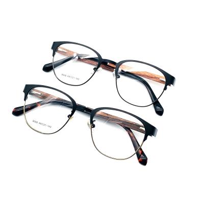 China 2021 Classic New Team Wooden Leg Design Retro Metal Frame Grain Glass Frame Eyeglasses Frames for sale