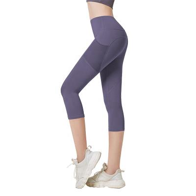 China 2021 Wholesale Cheap Breathable Gym Yoga Seamless Pants With Pockets For Women Plus Size 7 Minutes Pants Sportswear Workout Fitness Clothing for sale