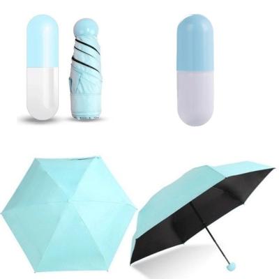 China Other Pocket Creative Black UV Coated Lightweight Anti Foldable Manual Umbrellas Multi Color Rainy Day Capsule Plastic Umbrella for sale